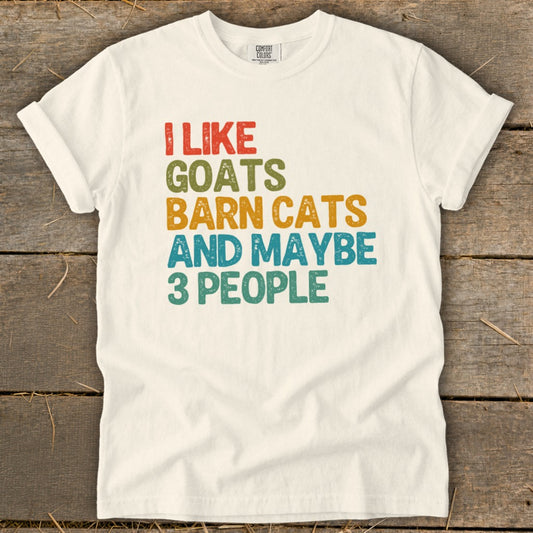 White t-shirt with text "I LIKE GOATS BARN CATS AND MAYBE 3 PEOPLE".