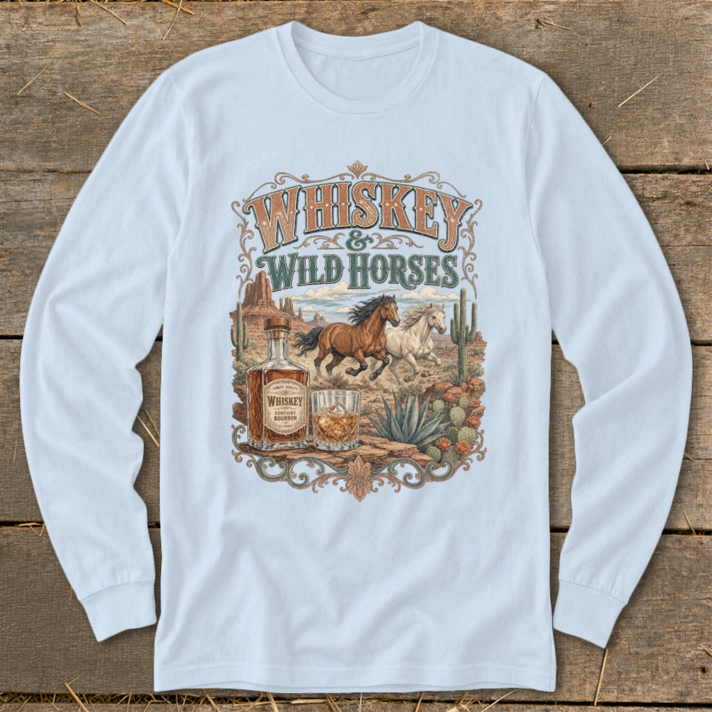 Long-sleeve shirt with "Whiskey & Wild Horses" graphic featuring horses, whiskey bottle, and desert landscape.