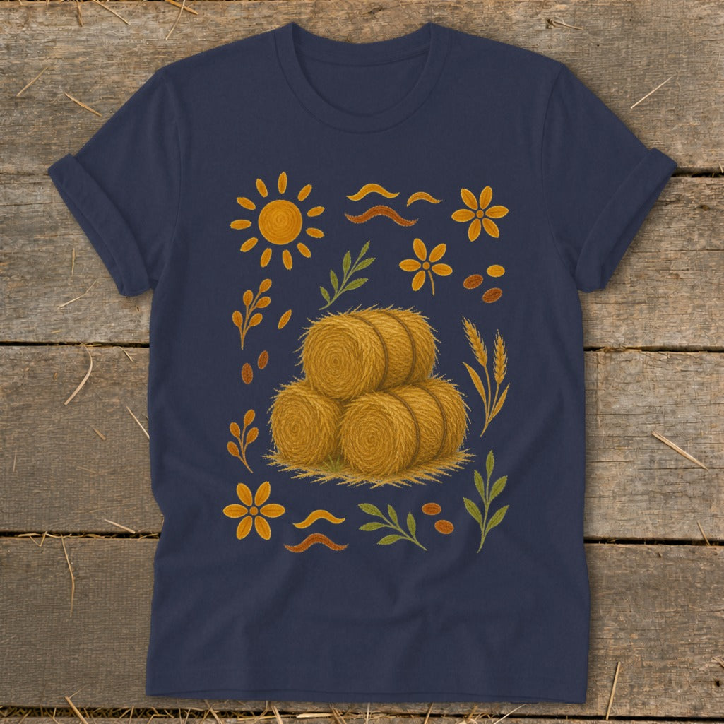 Navy t-shirt with a fall harvest graphic featuring hay bales and autumnal motifs.
