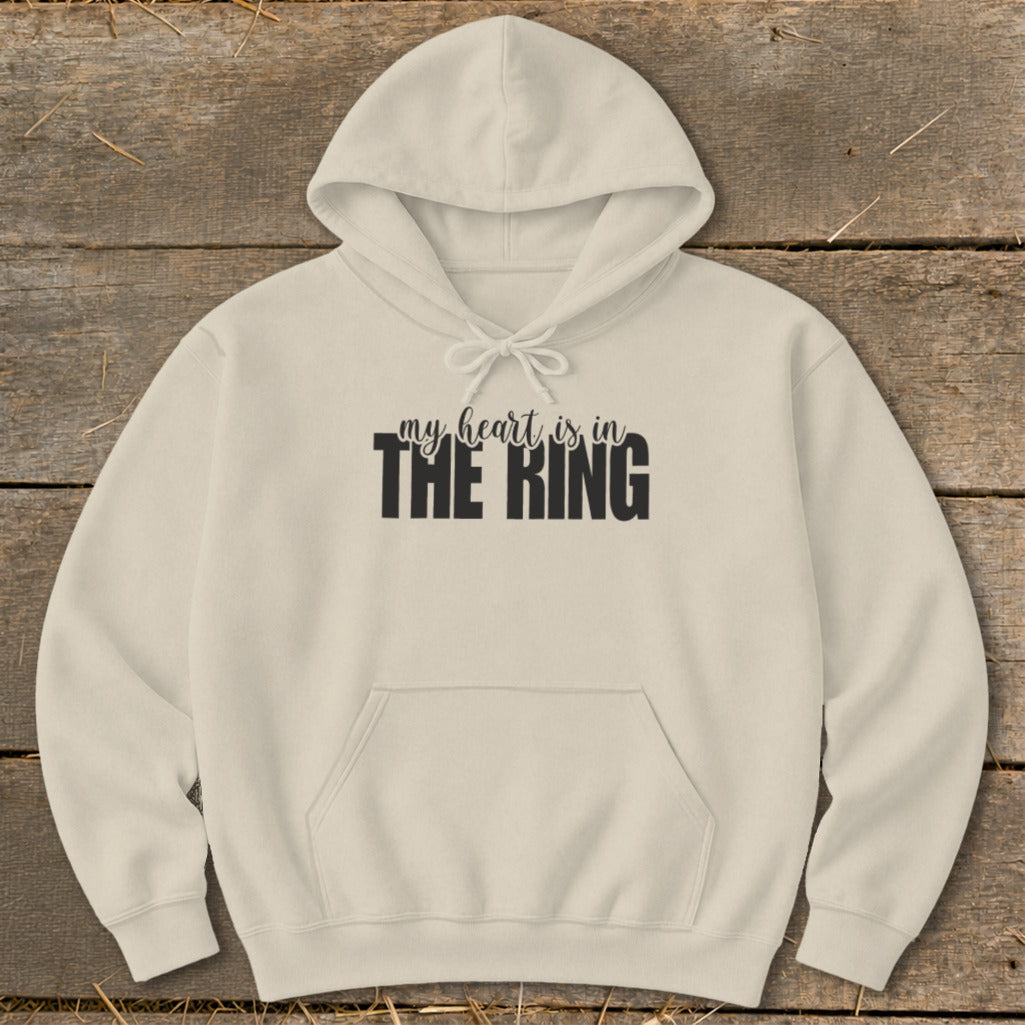 Cream hoodie with "my heart is in THE RING" text.
