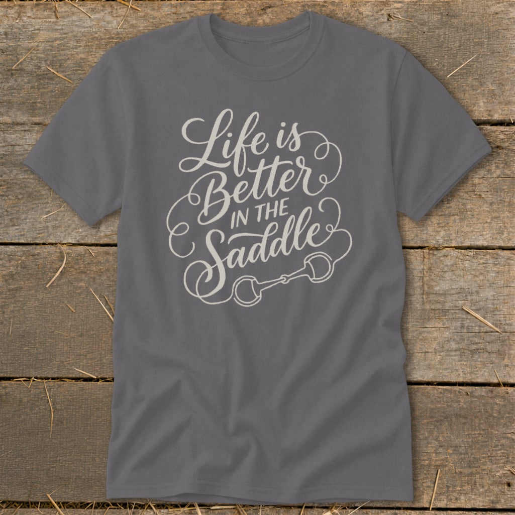 Gray t-shirt with white text "Life is Better IN THE Saddle" and horse bit graphic.