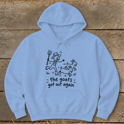 Light blue hoodie with a cartoon farmer chasing goats, text "the goats got out again".