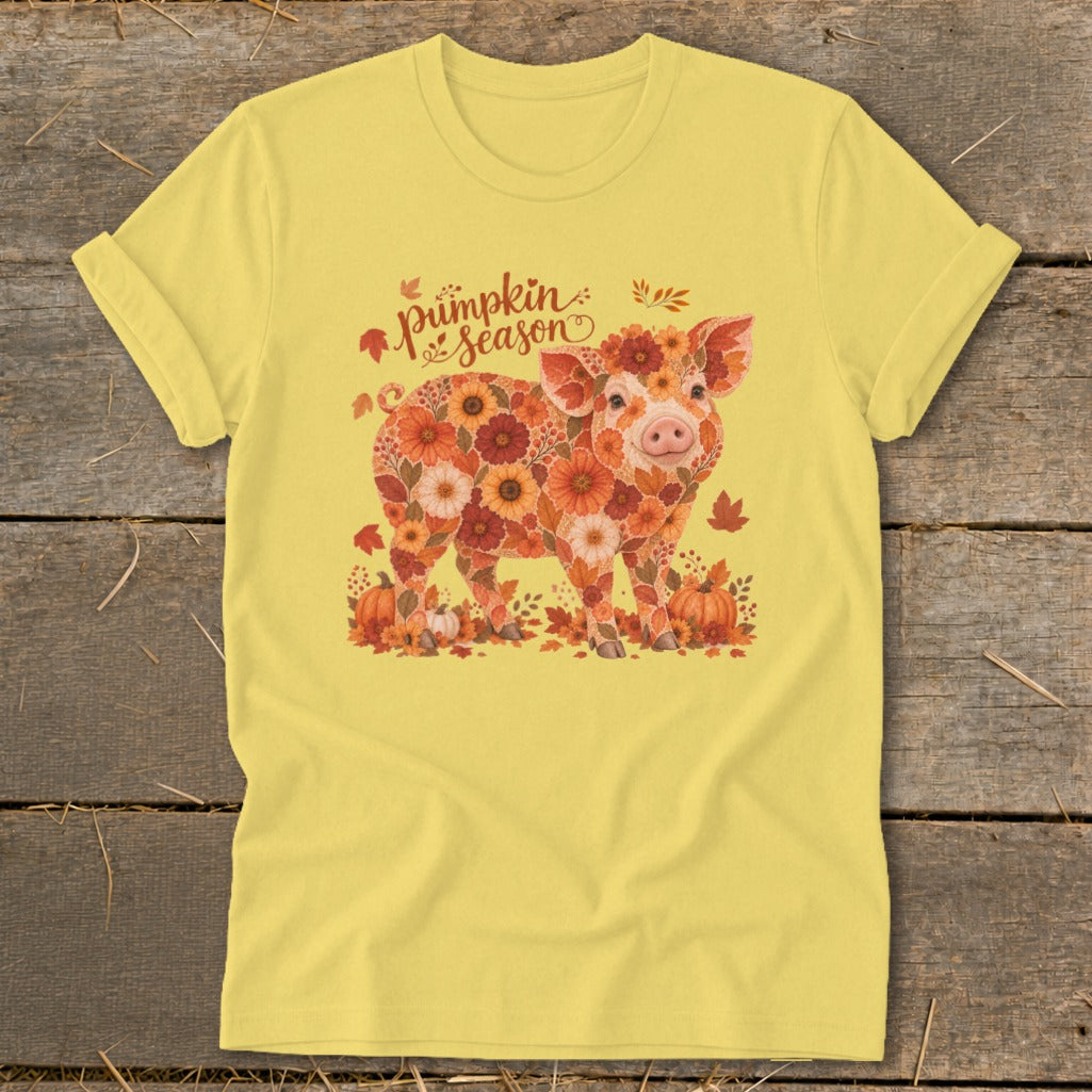 Yellow t-shirt with a floral pig illustration and "Pumpkin Season" text.