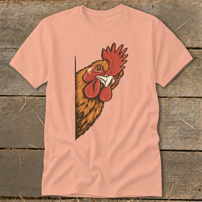 Peach t-shirt with a cartoon rooster peeking from the left edge.