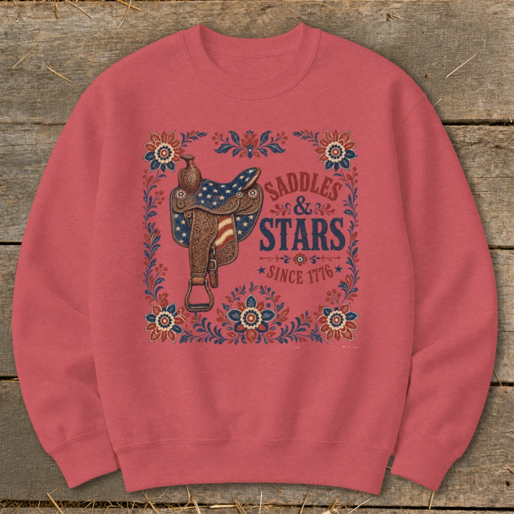 Red sweatshirt with American flag saddle and "Saddles & Stars Since 1776" graphic.