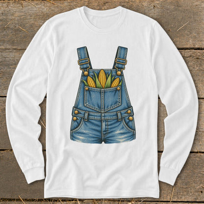 White long-sleeve shirt with a denim overall design featuring corn in the pocket.
