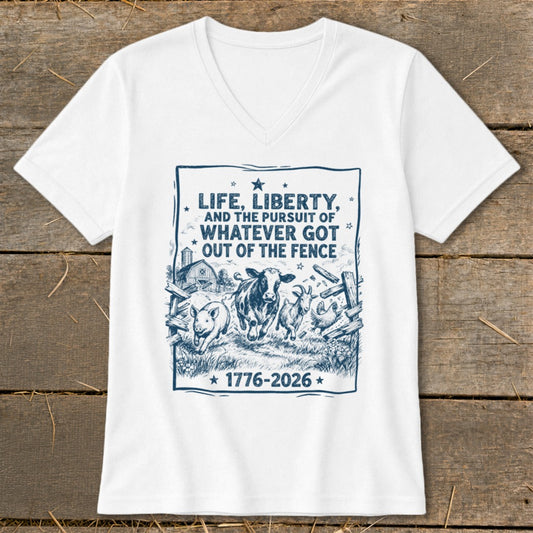White t-shirt with graphic of farm animals and text "Life, Liberty, and the pursuit of whatever got out of the fence 1776-2026".