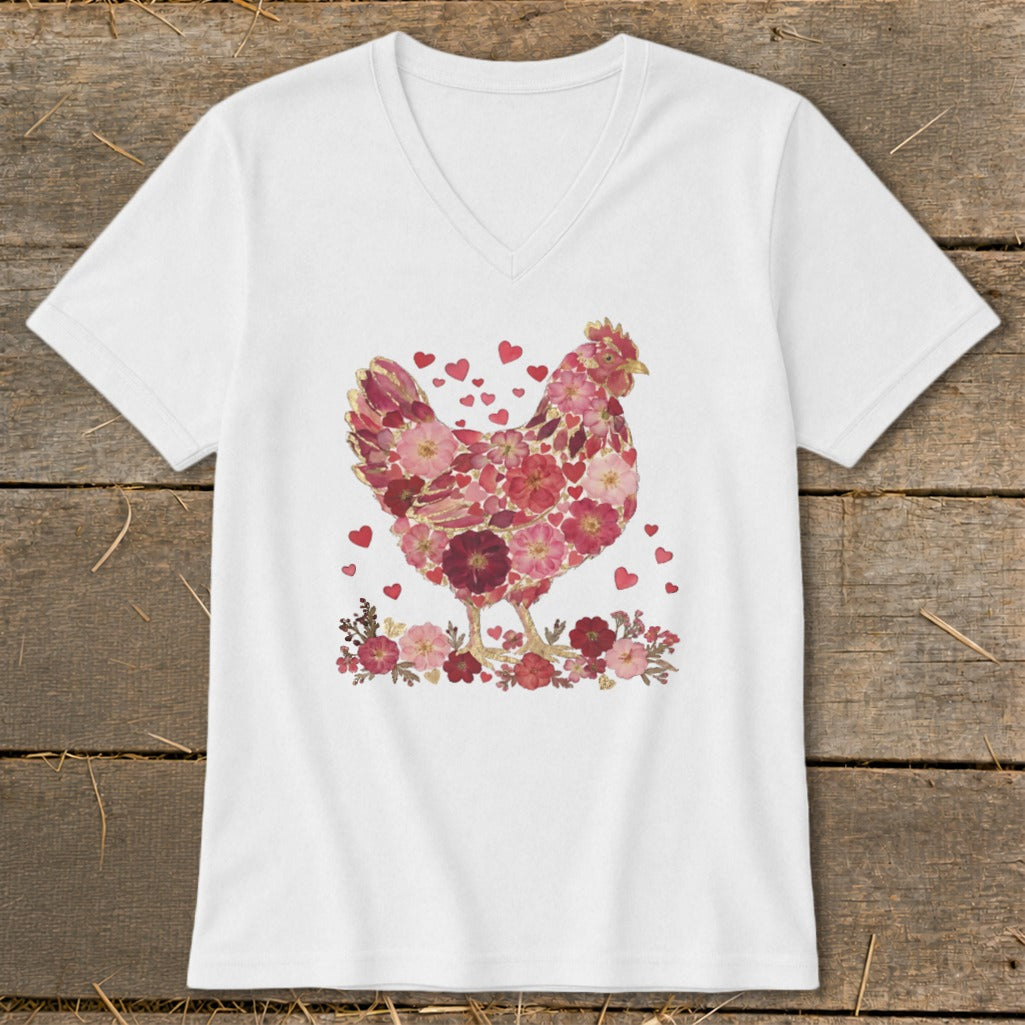 White v-neck t-shirt with a chicken graphic made of pink and red flowers and hearts.