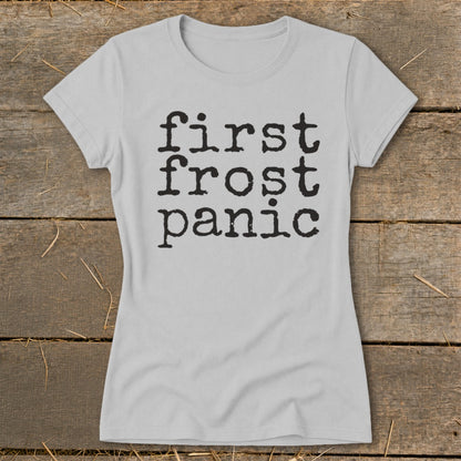 Light gray t-shirt with "first frost panic" in black distressed typewriter font.