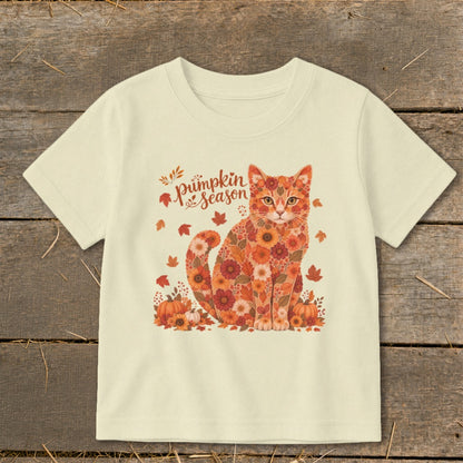 Cream t-shirt with a cat design made of flowers and pumpkins and text "pumpkin season".