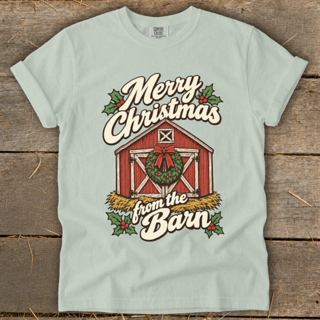 Light blue t-shirt with a barn, wreath, and "Merry Christmas from the Barn" text.