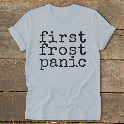 Light blue t-shirt with black text "first frost panic"