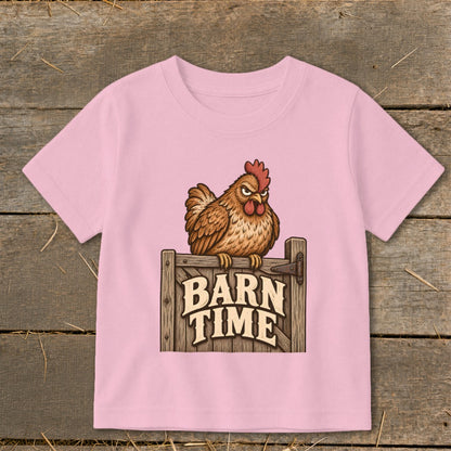 Pink t-shirt with a cartoon chicken sitting on a wooden gate that says "BARN TIME".