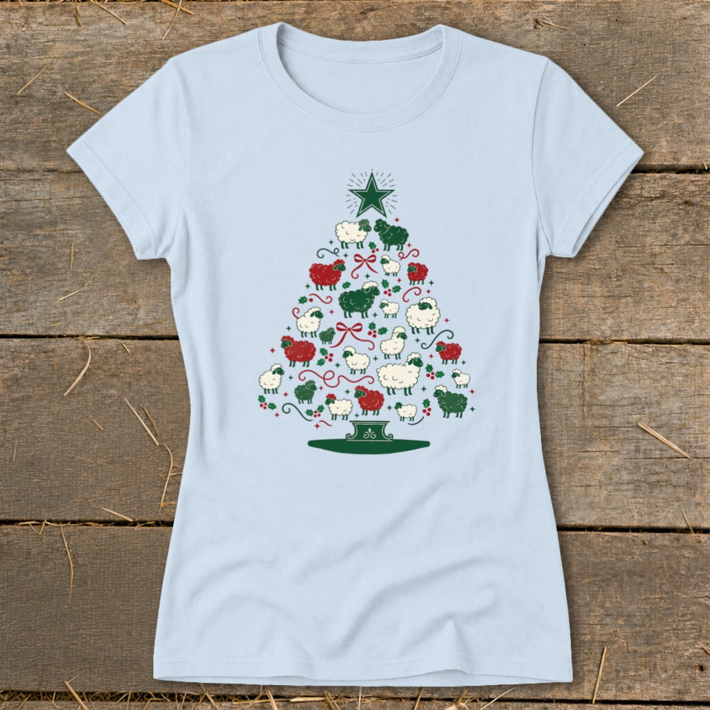 Light blue t-shirt with a Christmas tree made of sheep, stars, and ribbons.