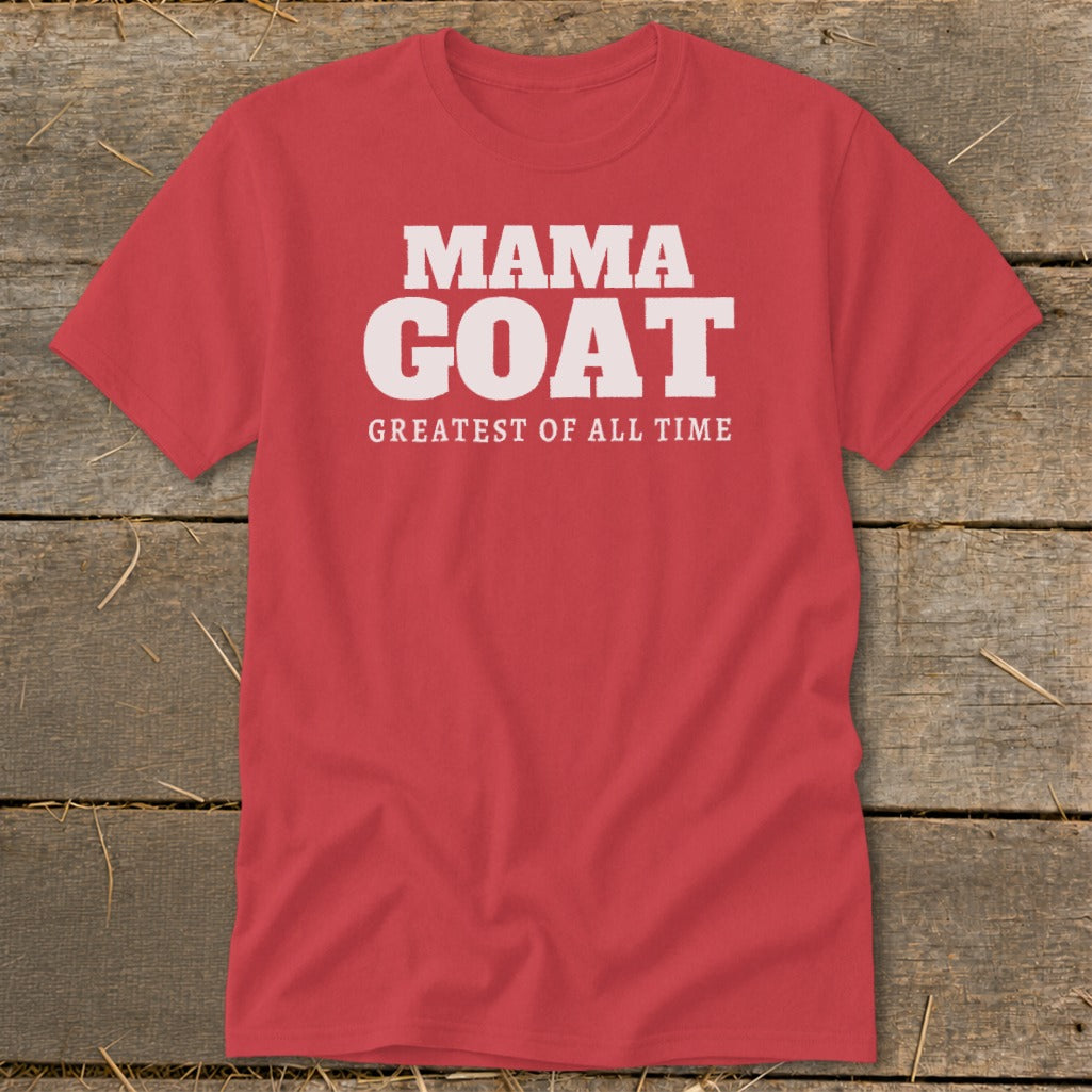 Red t-shirt with white text "MAMA GOAT GREATEST OF ALL TIME".