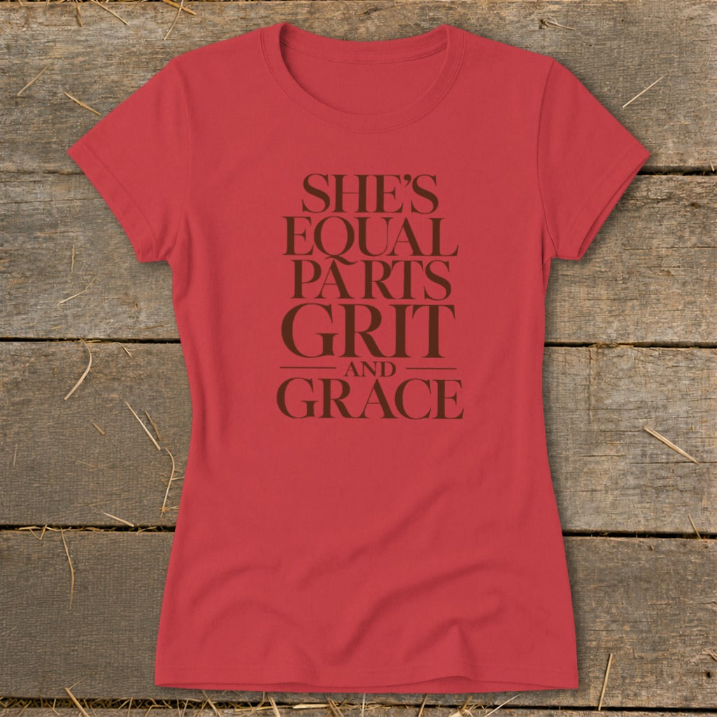 Red t-shirt with "She's Equal Parts Grit and Grace" text in brown.