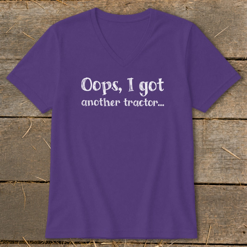 Purple v-neck t-shirt with white text "Oops, I got another tractor...".