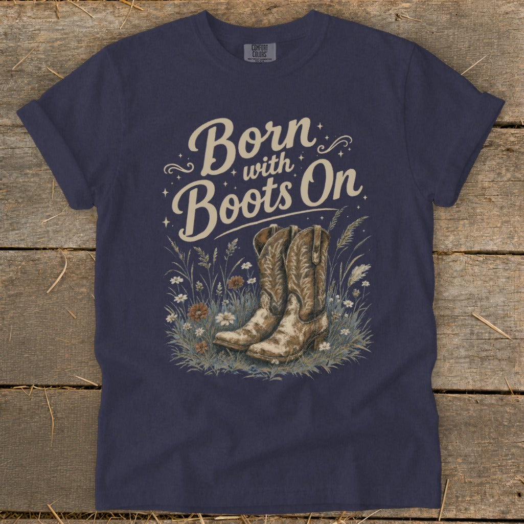 Navy t-shirt with "Born with Boots On" and cowboy boots graphic.
