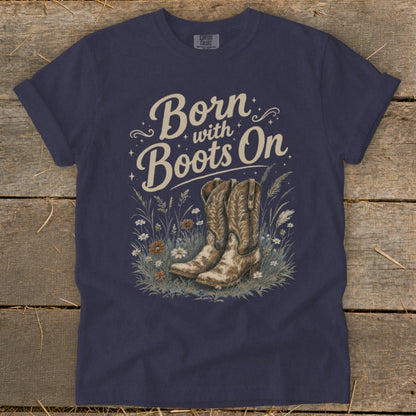 Navy t-shirt with "Born with Boots On" and cowboy boots graphic.