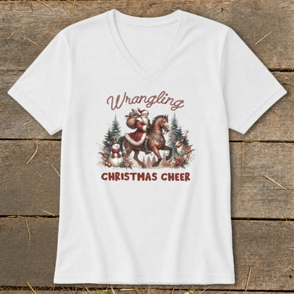 Santa riding a horse with a snowman and reindeer, with text "Wrangling Christmas Cheer".