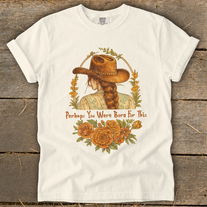 Cream t-shirt with artwork of a cowgirl and the text "Perhaps You Were Born For This".