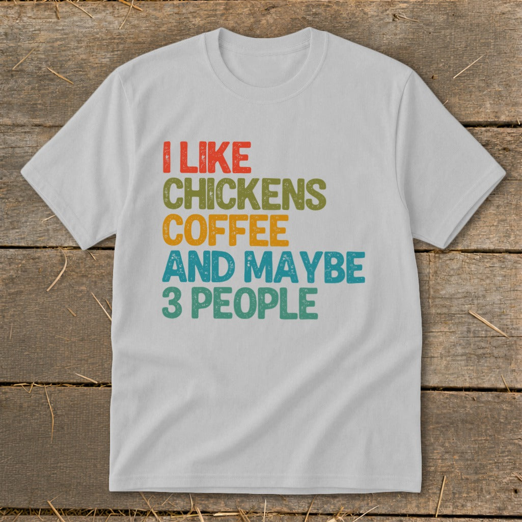 White t-shirt with "I like chickens coffee and maybe 3 people" text.