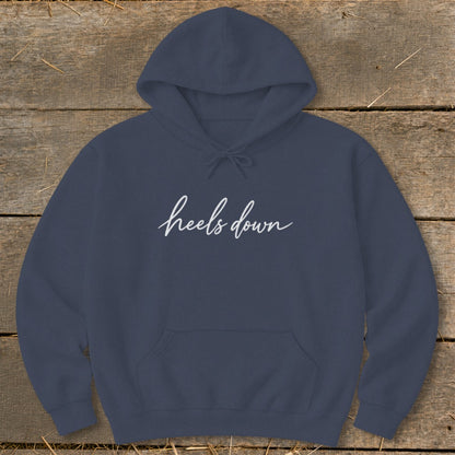 Navy blue hoodie with "heels down" in white cursive text.
