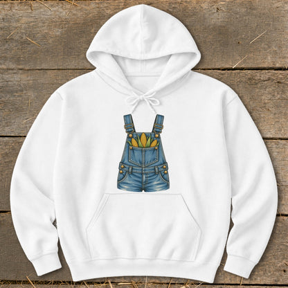 White hoodie with a graphic of denim overalls filled with corn cobs.