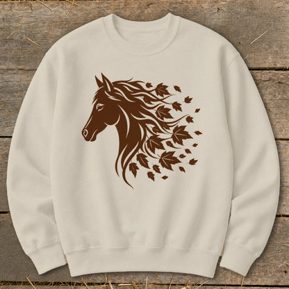 Beige sweatshirt with a brown horse head graphic with flowing mane made of leaves.
