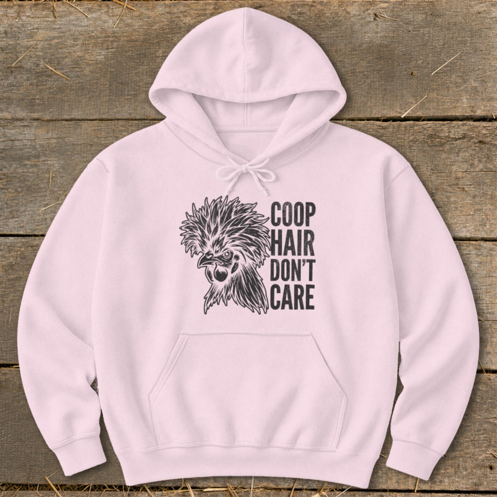 Pink hoodie with black chicken graphic and "COOP HAIR DON'T CARE" text.