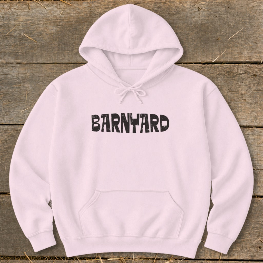 Light pink hooded sweatshirt featuring the word BARNYARD in black distressed text across the chest.