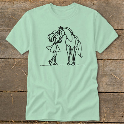 Girl gently touching nose of horse, minimalist line art on pale green t-shirt.