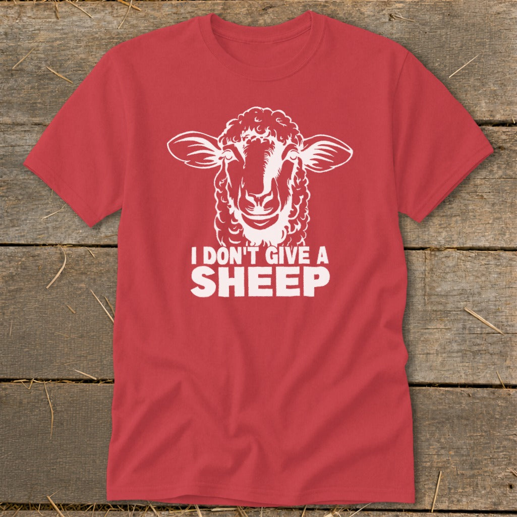 Red t-shirt with white graphic of a sheep's head and text "I DON'T GIVE A SHEEP".