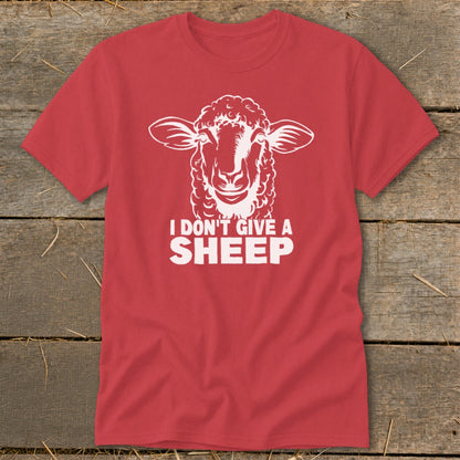 Red t-shirt with white graphic of a sheep's head and text "I DON'T GIVE A SHEEP".