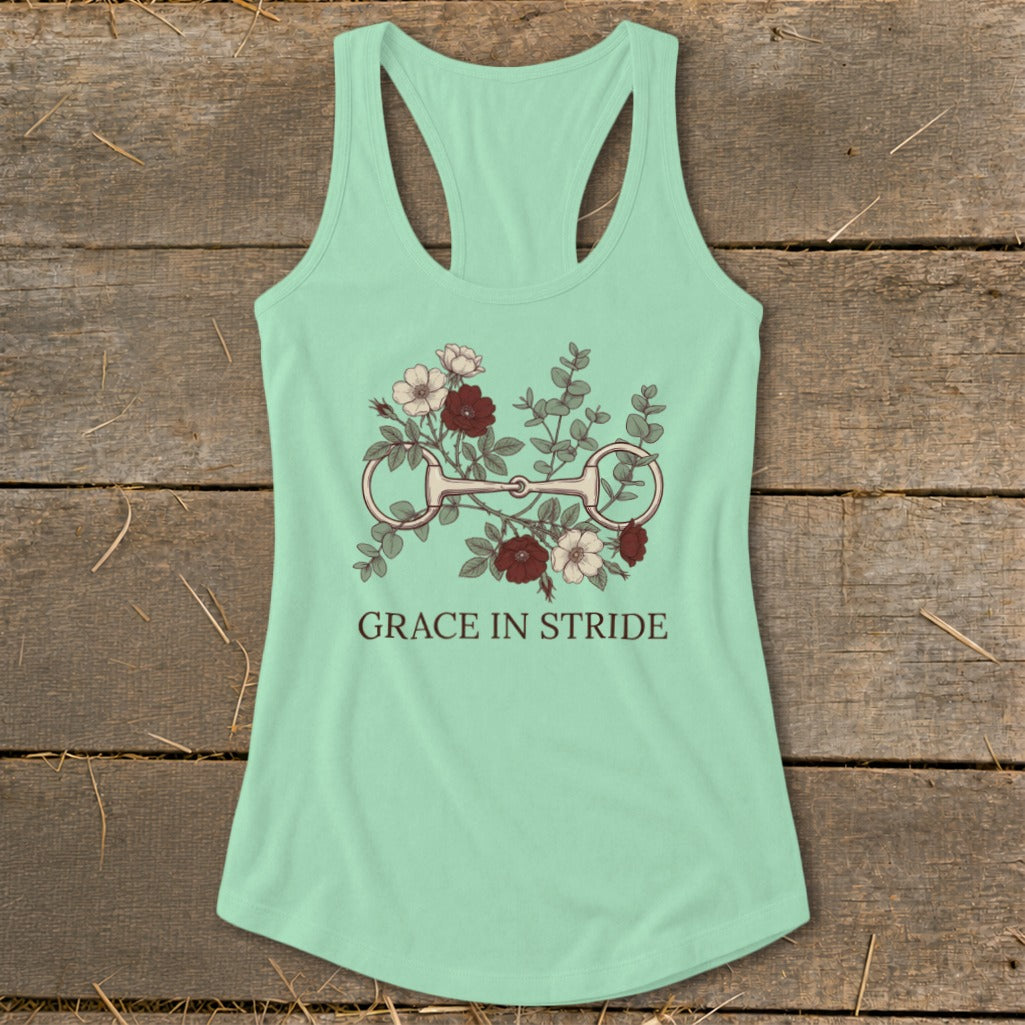 Mint green racerback tank top with floral bridle design and "Grace in Stride" text.