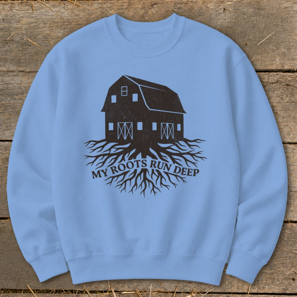 Light blue sweatshirt with a dark brown graphic of a barn with deep roots and text.