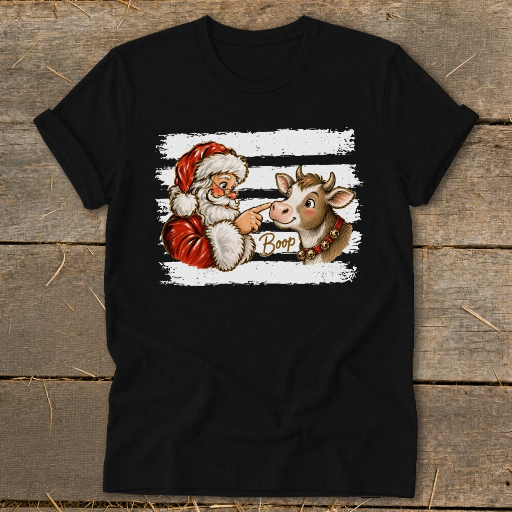 Santa booping a cow with the word "Boop" on a black t-shirt.