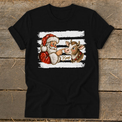 Santa booping a cow with the word "Boop" on a black t-shirt.