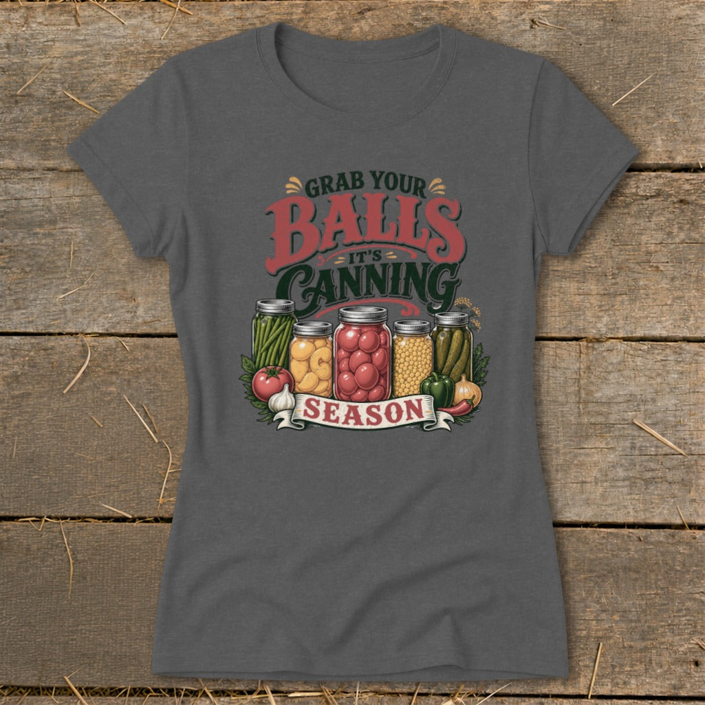 T-shirt with illustration of jars filled with produce, text "Grab Your Balls It's Canning Season".