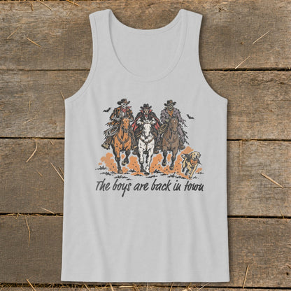 Skeleton cowboys and Dracula ride horses with a dog running alongside, with text.