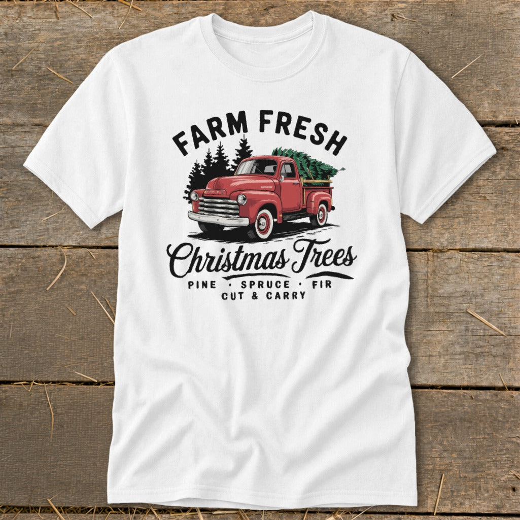 White t-shirt with red vintage truck carrying Christmas trees and text "FARM FRESH Christmas Trees".