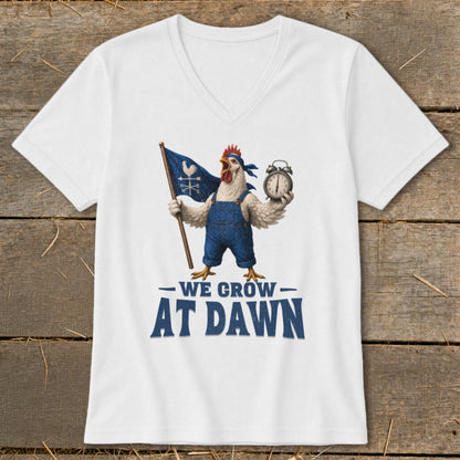 Chicken in overalls holding flag and alarm clock, text "We Grow At Dawn."