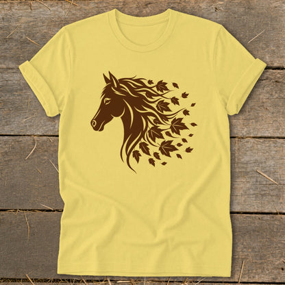Yellow t-shirt with a dark brown horse head and falling autumn leaves graphic.