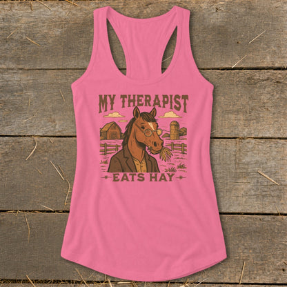 Pink tank top with a graphic of a horse wearing glasses and eating hay.