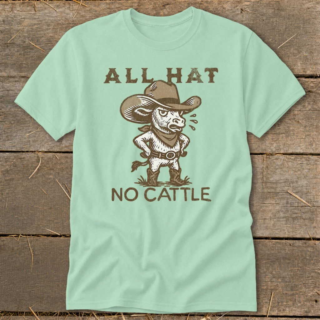 Light green t-shirt with cartoon bull wearing cowboy hat and boots, text "ALL HAT NO CATTLE".