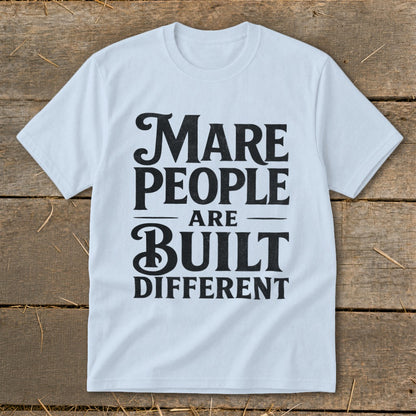 Light blue t-shirt with black text "Mare people are built different".