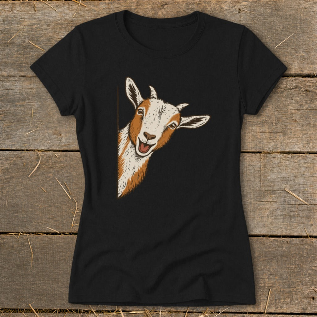 Black t-shirt with a graphic of a peeking goat with brown and white markings.