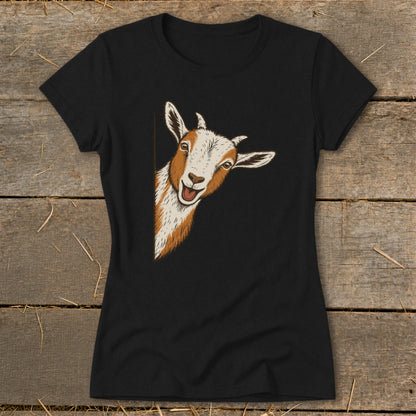 Black t-shirt with a graphic of a peeking goat with brown and white markings.