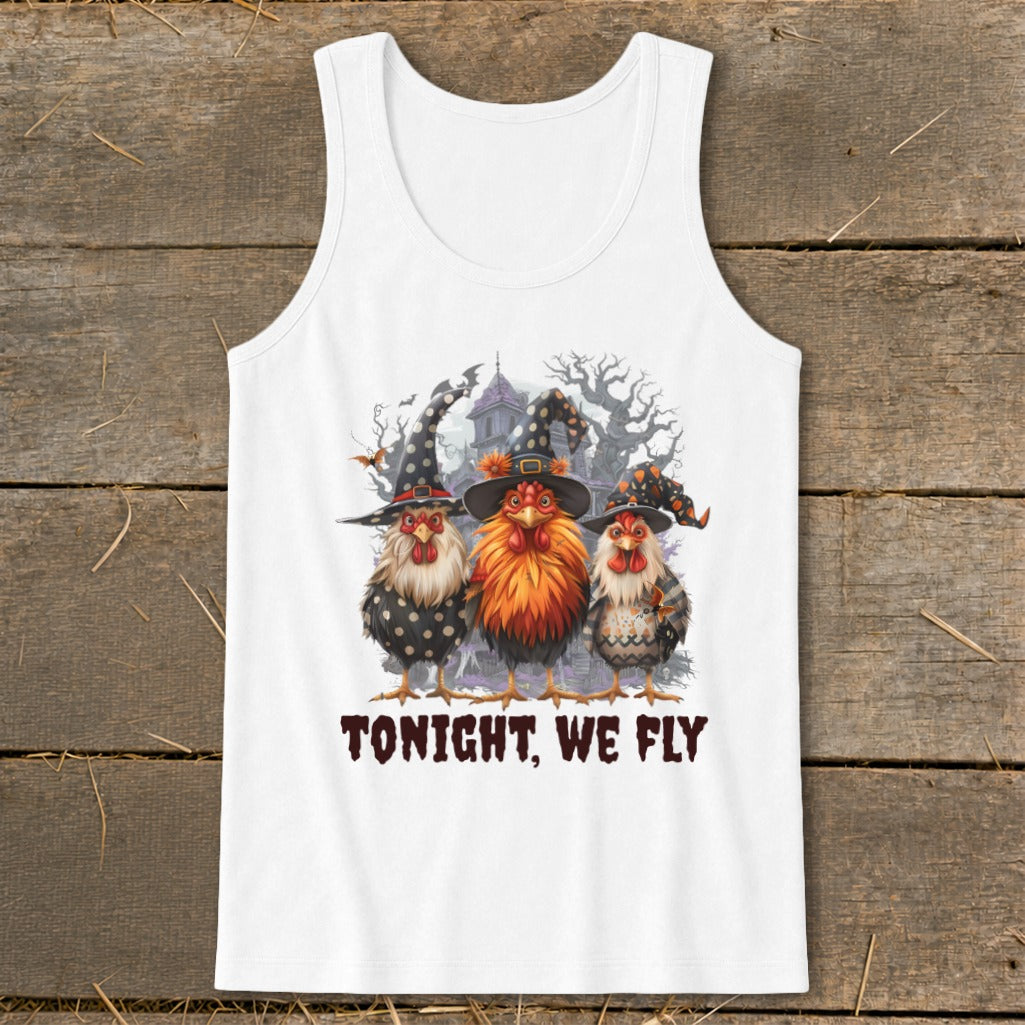 Three chickens wearing witch hats, with haunted house background and text "TONIGHT, WE FLY".