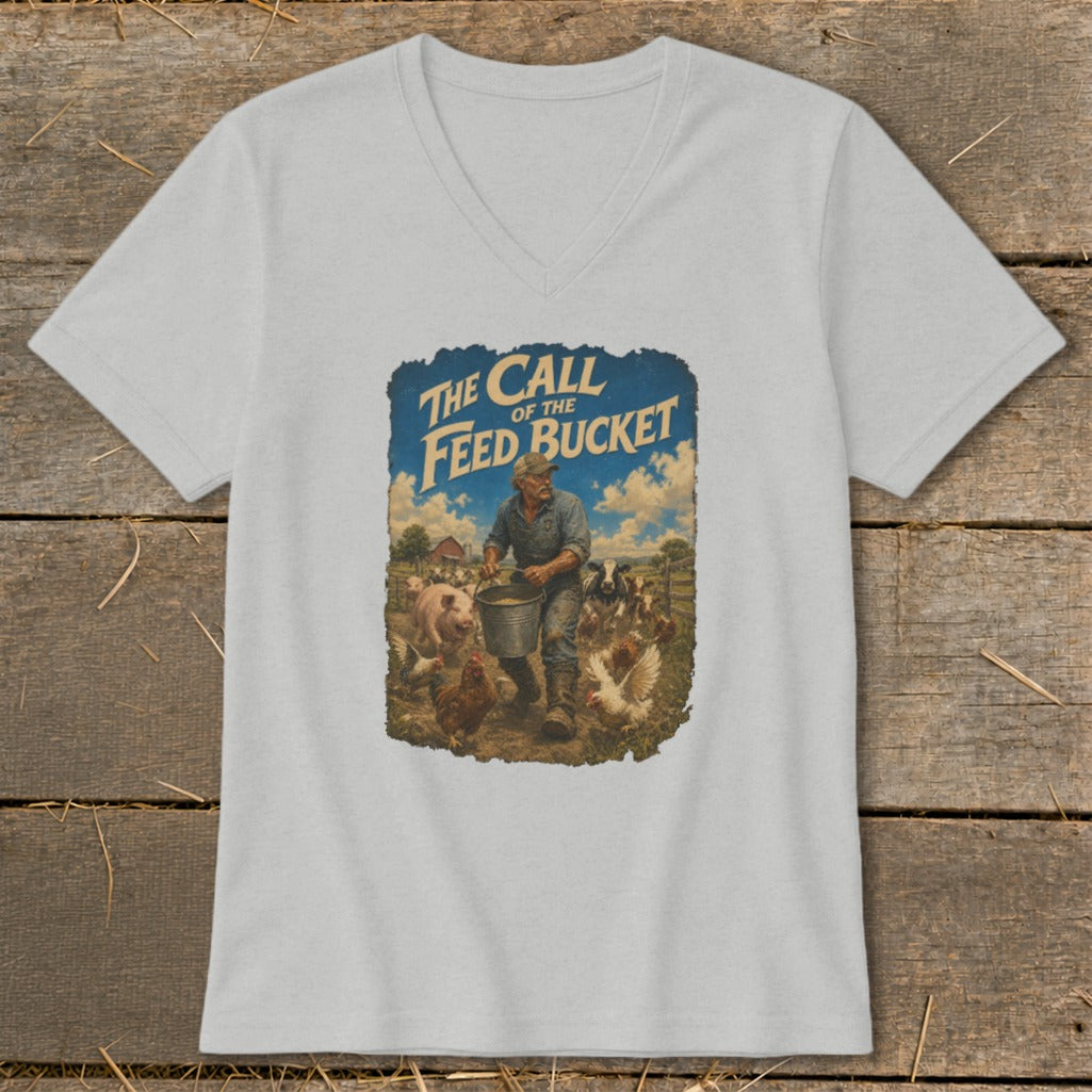 T-shirt graphic: Farmer feeding animals, "The Call of the Feed Bucket."